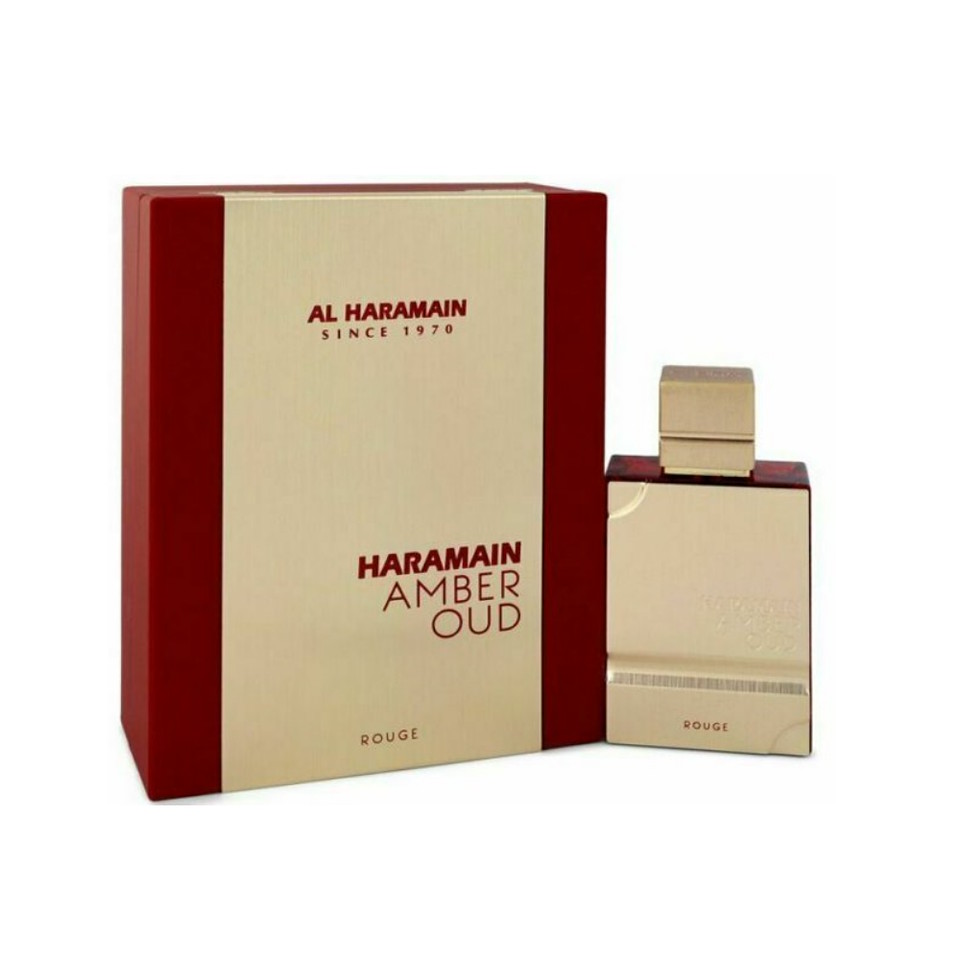 Al Haramain Amber Oud Rouge EDP is a vibrant unisex fragrance that combines warm amber with exotic and spicy notes. This 2 oz (60 ml) spray offers a luxurious, long-lasting scent, ideal for making a bold statement on any occasion.